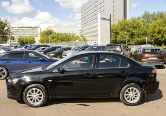 Подержанный автомобиль Mitsubishi Lancer Sedan 2014 года (5 фото)