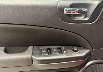 Подержанный автомобиль Dodge Caliber 2010 года (16 фото)