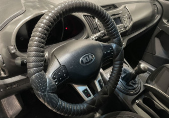 Подержанный автомобиль Kia Sportage 2013 года (14 фото)