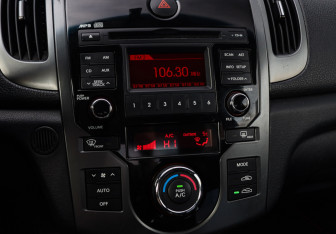 Подержанный автомобиль Kia Cerato Coupe 2011 года (13 фото)