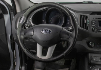 Подержанный автомобиль Kia Sportage 2014 года (15 фото)