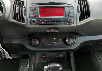 Подержанный автомобиль Kia Sportage 2012 года (23 фото)