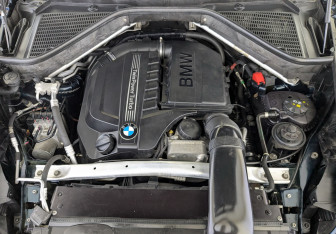 Подержанный автомобиль BMW X6 2013 года (9 фото)