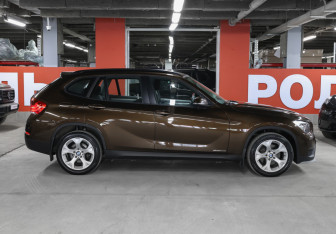 Подержанный автомобиль BMW X1 2014 года (4 фото)