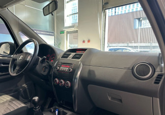 Подержанный автомобиль Suzuki SX4 Hatchback 2009 года (10 фото)