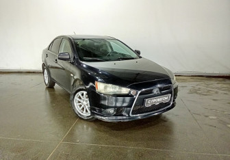 Подержанный автомобиль Mitsubishi Lancer Sedan 2014 года (3 фото)