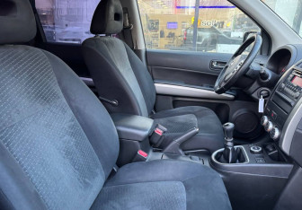 Подержанный автомобиль Nissan X-Trail 2014 года (10 фото)