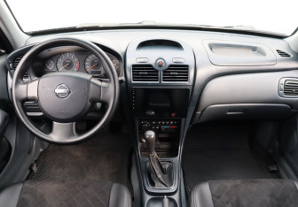 Подержанный автомобиль Nissan Almera Classic 2007 года (13 фото)