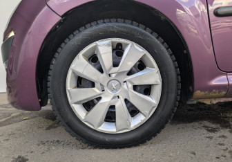 Подержанный автомобиль Peugeot 107 2012 года (12 фото)