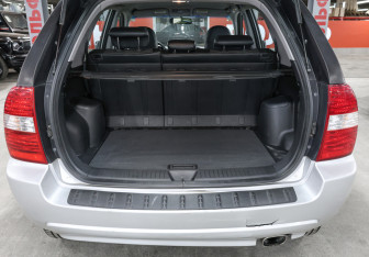Подержанный автомобиль Kia Sportage 2006 года (10 фото)