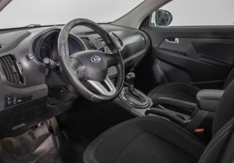 Подержанный автомобиль Kia Sportage 2014 года (10 фото)