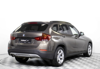 Подержанный автомобиль BMW X1 2013 года (5 фото)