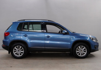 Подержанный автомобиль Volkswagen Tiguan 2014 года (8 фото)