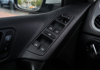 Подержанный автомобиль Volkswagen Tiguan 2014 года (15 фото)