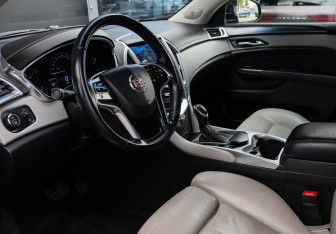 Подержанный автомобиль Cadillac SRX 2014 года (12 фото)