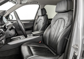 Подержанный автомобиль BMW X5 2015 года (20 фото)