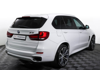 Подержанный автомобиль BMW X5 2014 года (5 фото)