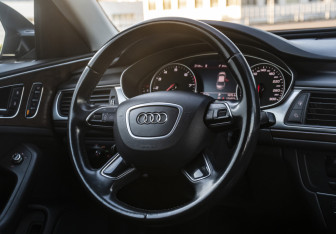 Подержанный автомобиль Audi A6 Sedan 2015 года (10 фото)