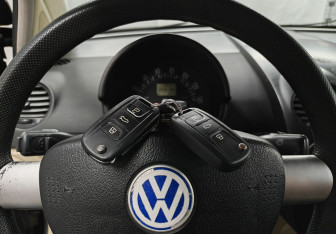 Подержанный автомобиль Volkswagen Beetle Hatchback 1999 года (16 фото)