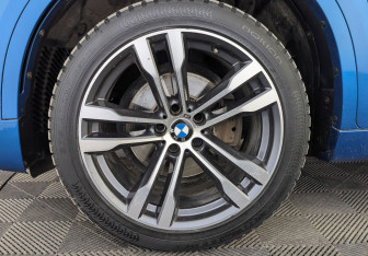 Подержанный автомобиль BMW X6 2018 года (12 фото)