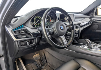 Подержанный автомобиль BMW X6 2016 года (16 фото)