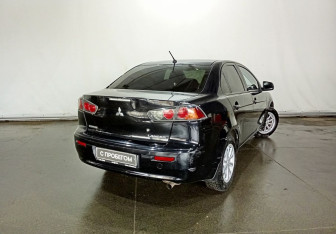 Подержанный автомобиль Mitsubishi Lancer Sedan 2014 года (6 фото)