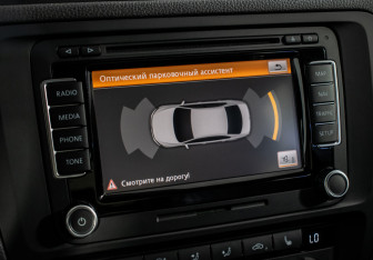 Подержанный автомобиль Volkswagen Jetta Sedan 2012 года (14 фото)