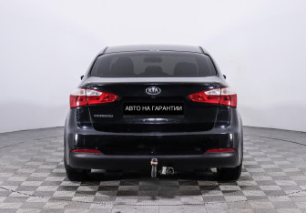 Подержанный автомобиль Kia Cerato Sedan 2013 года (6 фото)
