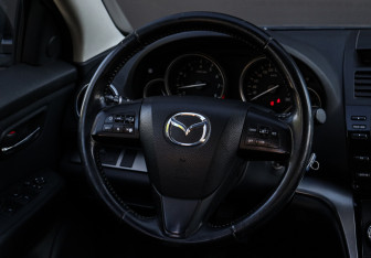 Подержанный автомобиль Mazda 6 Liftback 2010 года (11 фото)