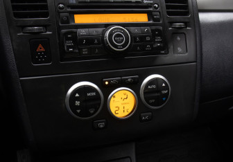 Подержанный автомобиль Nissan Tiida Sedan 2010 года (17 фото)