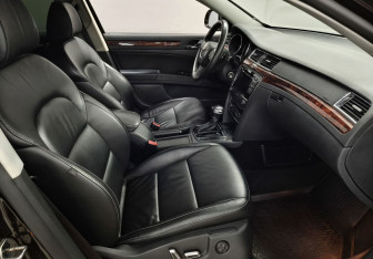 Подержанный автомобиль Skoda Superb Wagon 2013 года (10 фото)