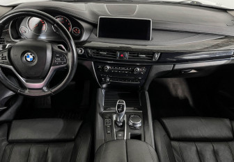Подержанный автомобиль BMW X6 2016 года (11 фото)