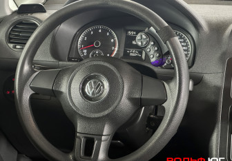 Подержанный автомобиль Volkswagen Caddy Compactvan 2012 года (13 фото)