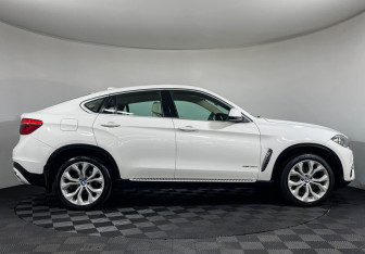 Подержанный автомобиль BMW X6 2015 года (6 фото)