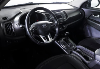 Подержанный автомобиль Kia Sportage 2013 года (14 фото)