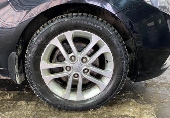 Подержанный автомобиль Kia Cerato Sedan 2011 года (16 фото)