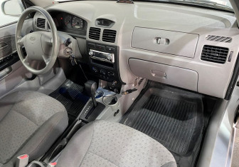 Подержанный автомобиль Kia Rio Sedan 2010 года (11 фото)