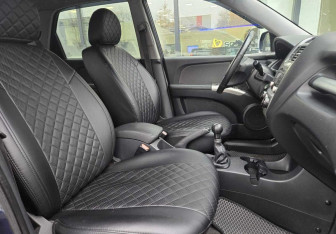 Подержанный автомобиль Kia Sportage 2010 года (10 фото)