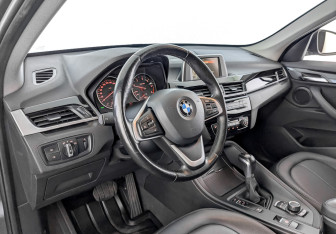 Подержанный автомобиль BMW X1 2016 года (16 фото)
