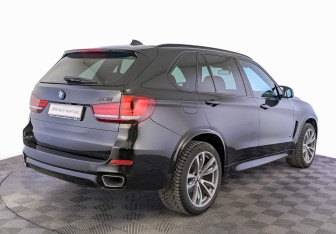 Подержанный автомобиль BMW X5 2015 года (5 фото)
