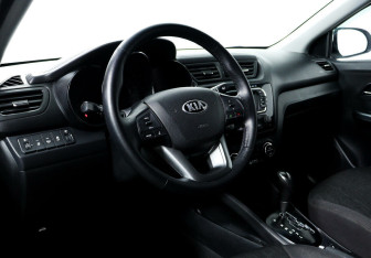 Подержанный автомобиль Kia Rio Sedan 2013 года (9 фото)
