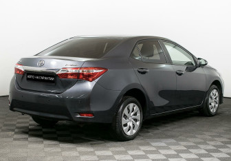 Подержанный автомобиль Toyota Corolla Sedan 2013 года (5 фото)