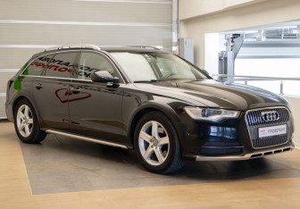 Подержанный автомобиль Audi A6 allroad 2014 года (3 фото)