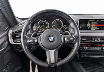 Подержанный автомобиль BMW X5 2014 года (22 фото)