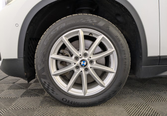 Подержанный автомобиль BMW X1 2018 года (12 фото)