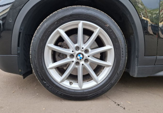 Подержанный автомобиль BMW X1 2015 года (9 фото)