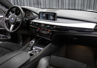 Подержанный автомобиль BMW X6 2017 года (11 фото)