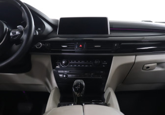 Подержанный автомобиль BMW X6 2015 года (14 фото)