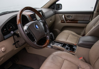 Подержанный автомобиль Kia Sorento 2002 года (14 фото)