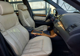 Подержанный автомобиль BMW X5 2005 года (22 фото)
